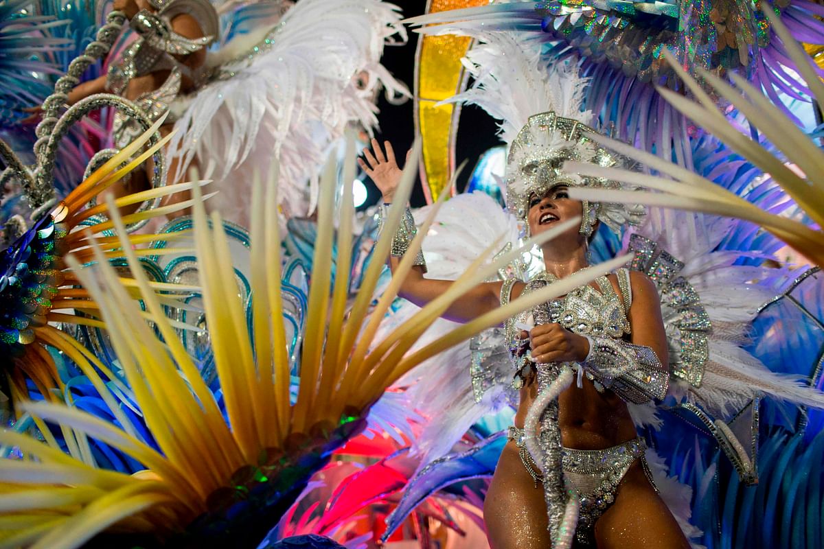 A reveller of the Beija-Flor samba school performs during the second night of Rio`s Carnival at the Sambadrome in Rio de Janeiro, Brazil, on 13 February, 2018. Photo: AFP