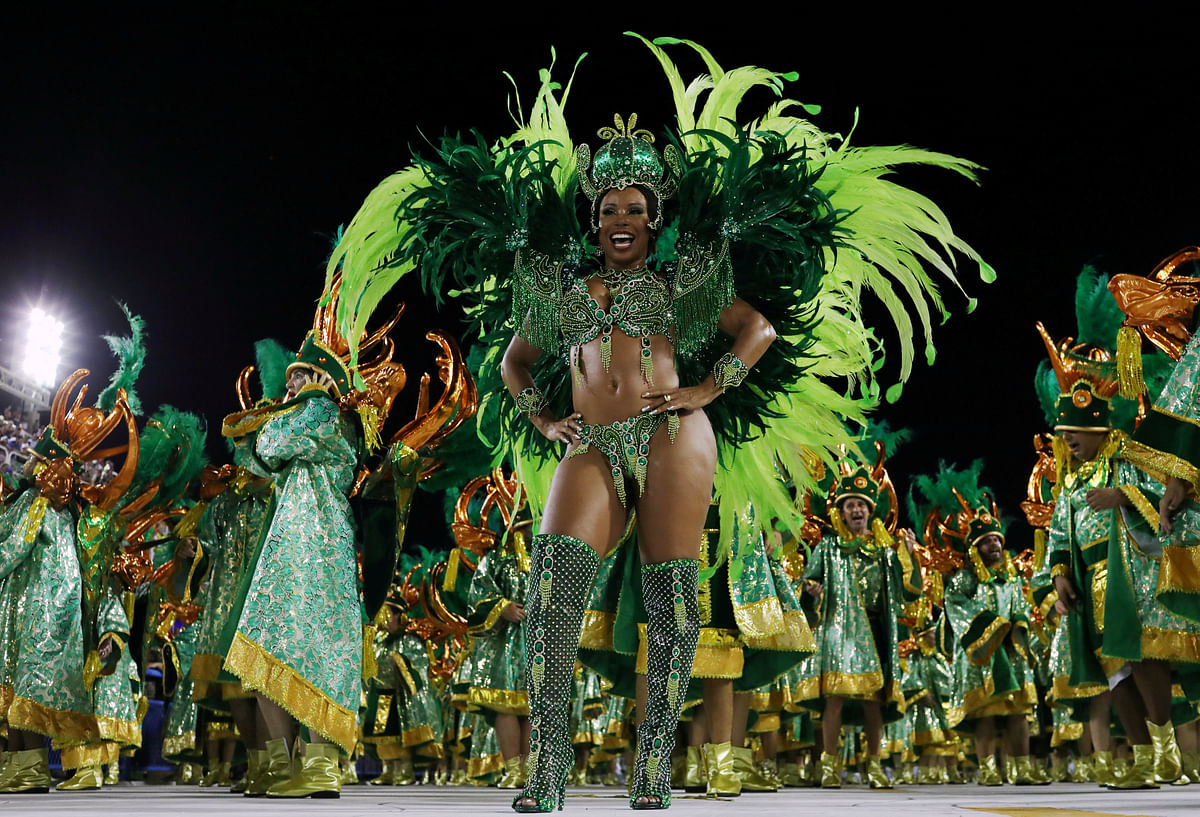 A reveller from Imperio Serrano samba school performs during the first night of the Carnival parade at the Sambadrome in Rio de Janeiro. Photo: Reuters