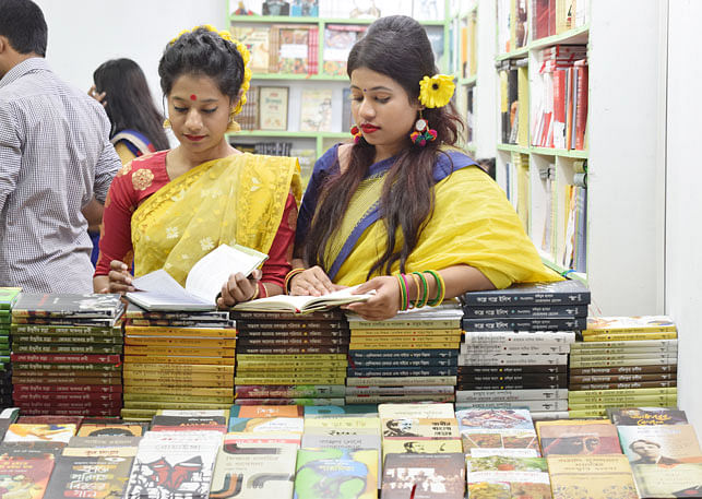 The sales executives at the book stalls also celebrated the day wearing colourful dresses. The photo was taken at the Amar Ekushey Grantha Mela on 13 February 2018. Photo: Quamrul Hassan