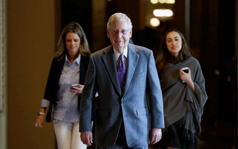 Senate Majority Leader Mitch McConnell (R-KY) walks to the Senate floor before a series of votes on immigration reform on Capitol Hill in Washington, US, on 15 February 2018. Reuters