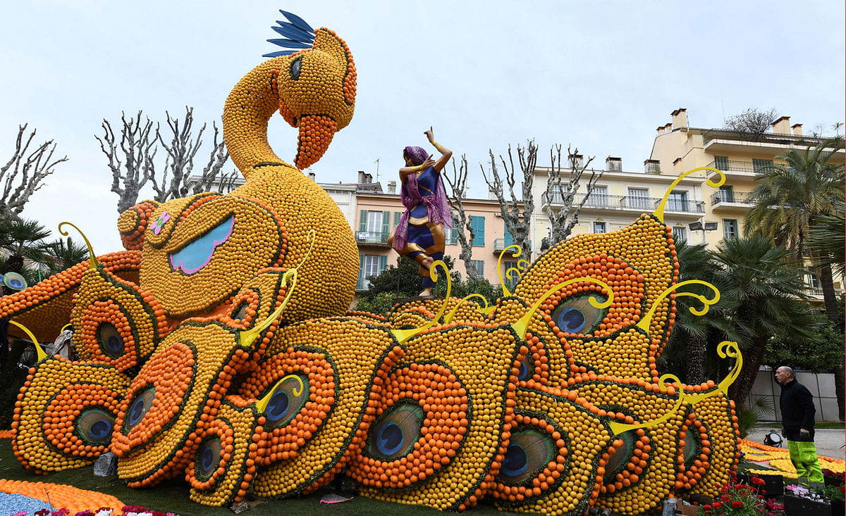 A sculpture made with lemons and oranges which depicts a Bollywood scenery with traditional dancer is seen during the 85th Lemon festival around the theme “Bollywood” in Menton, France on 15 February. Photo: Reuters