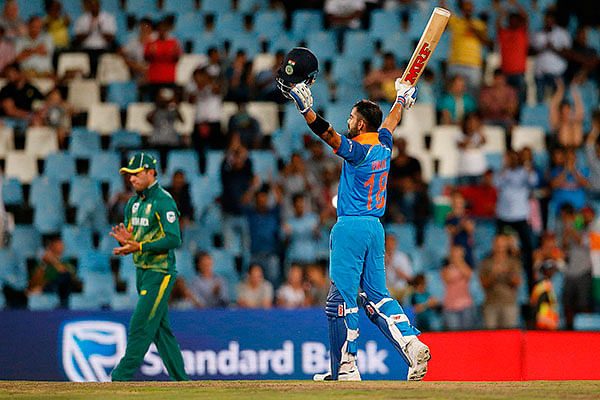 India batsman and captain Virat Kohli celebrates after scoring a century during the sixth One Day International cricket match between South Africa and India at the Super Sport Park in Centurion on 16 February, 2018. Photo: AFP
