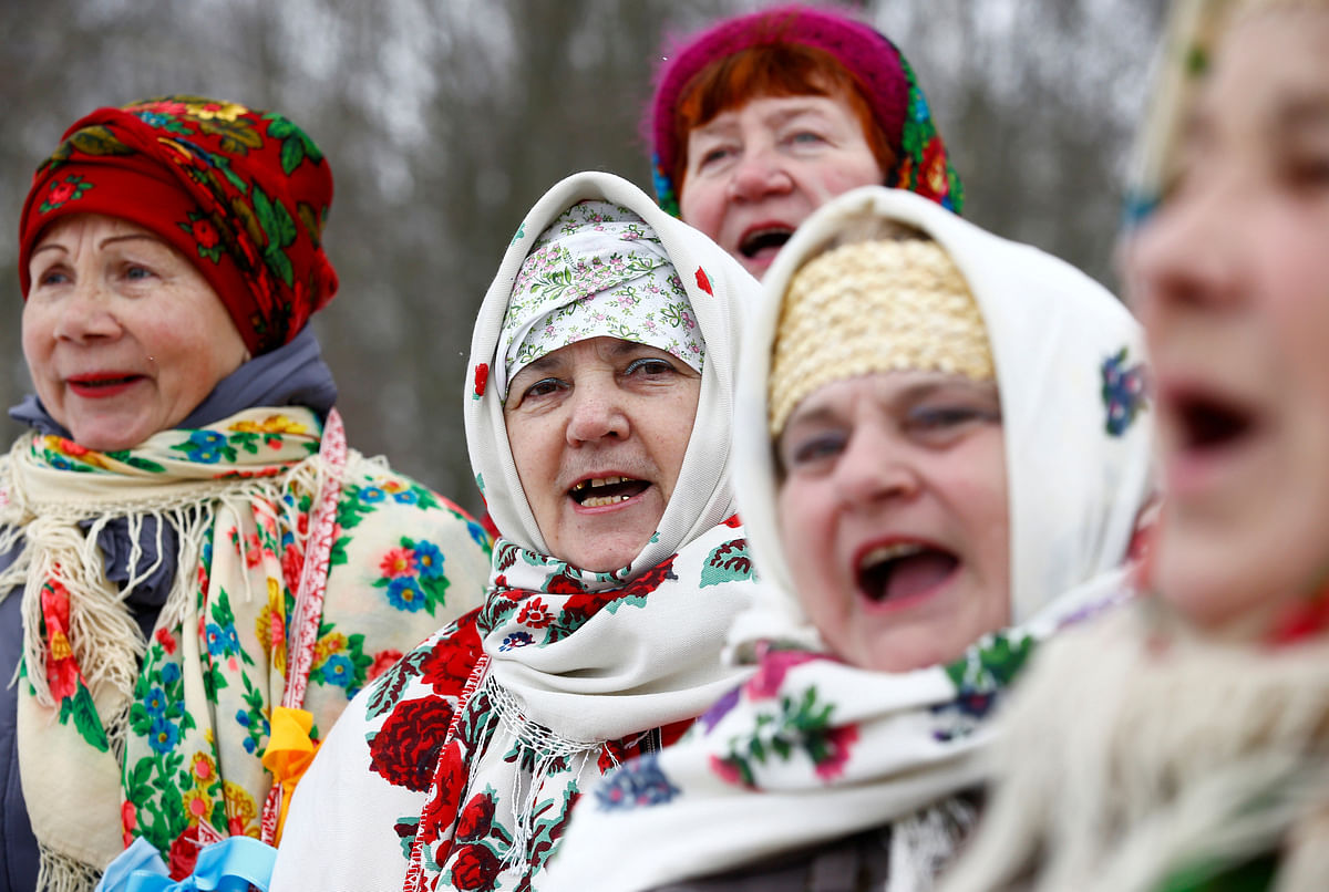 Women in Belarusian national clothes sing songs during celebration of Maslenitsa, or Pancake Week, in Belarusian state museum of folk architecture and rural lifestyle near the village Aziarco, Belarus on 17 February.  Photo: Reuters