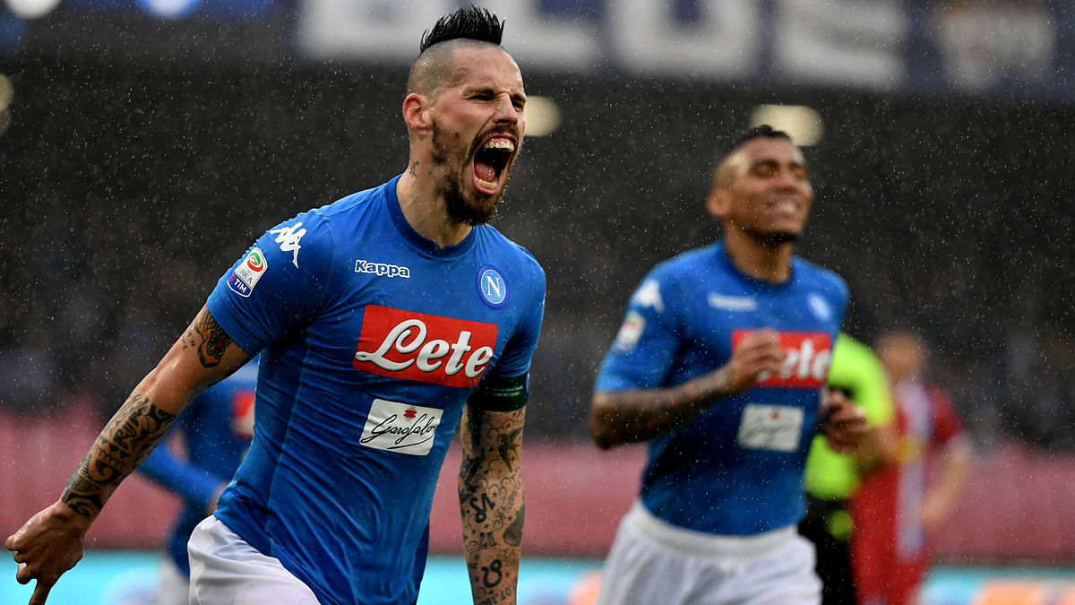 Napoli`s Slovakian midfielder Marek Hamsik celebrates after scoring a goal before it is disallowed due to offside during the Serie A football match between Napoli and Spal at San Paolo Stadium Stadium in Naples on 18 February, 2018. Photo: AFP