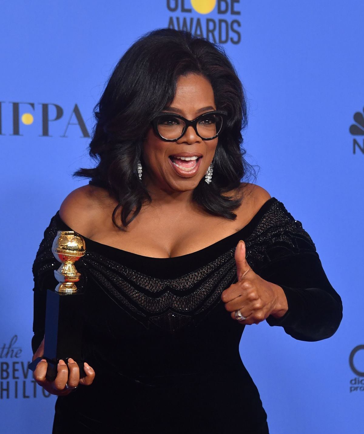 Oprah Winfrey poses with the Cecil B. DeMille Award during the 75th Golden Globe Awards in Beverly Hills, California on 7 January, 2018. Photo: AFP
