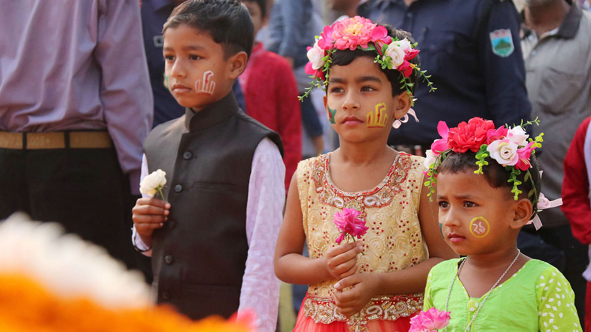 Children waiting for their turn to pay respect to the language martyrs on the International Mother Language Day on 21 February at Pabna central Shaheed Minar. Photo: Hasan Mahmud