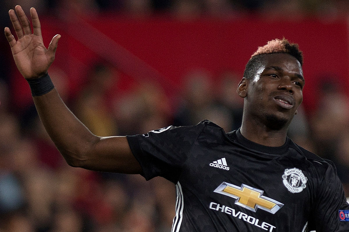 Manchester United’s French midfielder Paul Pogba reacts during the UEFA Champions League round of 16 first leg football match Sevilla FC against Manchester United at the Ramon Sanchez Pizjuan stadium in Sevilla on Wednesday. Photo: AFP