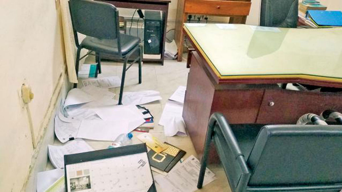 BCL activists ransack the office of the supervising engineer of Chittagong University on Thursday. Photo: Collected