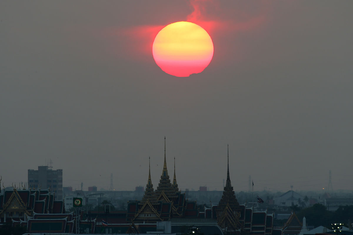 Sunset is seen near the Grand Palace in Bangkok, Thailand on 21 February. Photo: Reuters