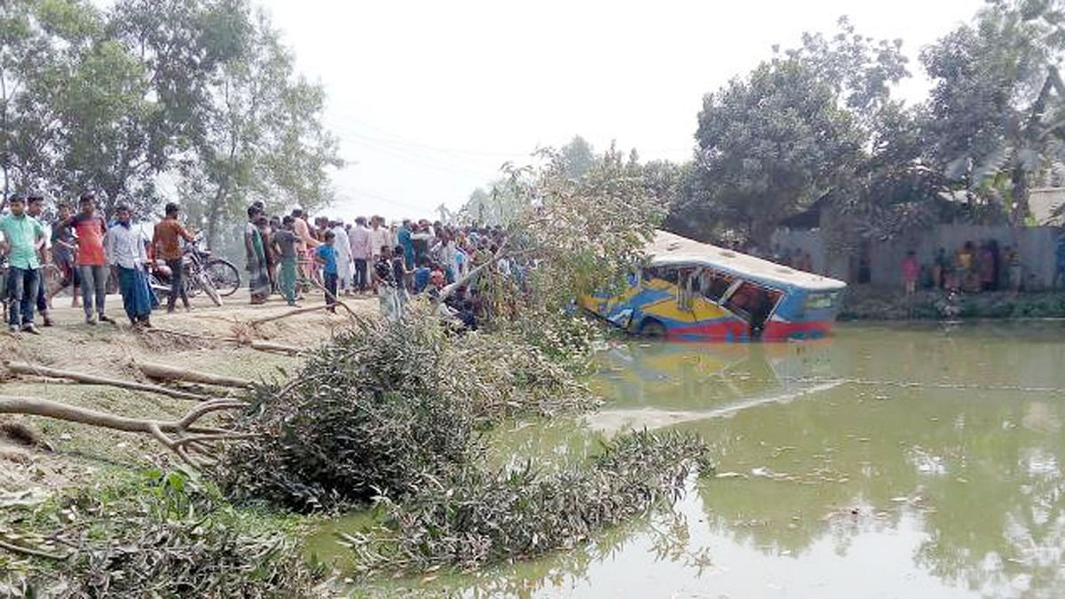 Four people were killed after a bus overturned on Mymensingh-Kishoreganj highway on 23 February. Photo: Prothom Alo