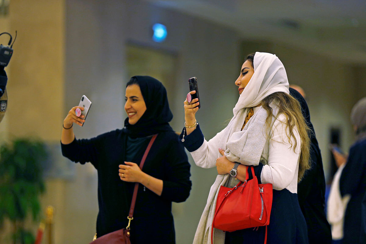 Saudi people attend the concert of composer Yanni at Princess Nourah bint Abdulrahman University in Riyadh, Saudi Arabia on 3 December 2017. Reuters File Photo