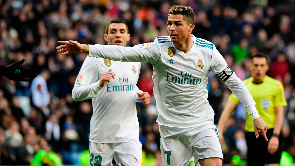Real Madrid’s Portuguese forward Cristiano Ronaldo celebrates after scoring afduring the Spanish league football match between Real Madrid CF and Deportivo Alaves at the Santiago Bernabeu stadium in Madrid on Saturday. Photo: AFP
