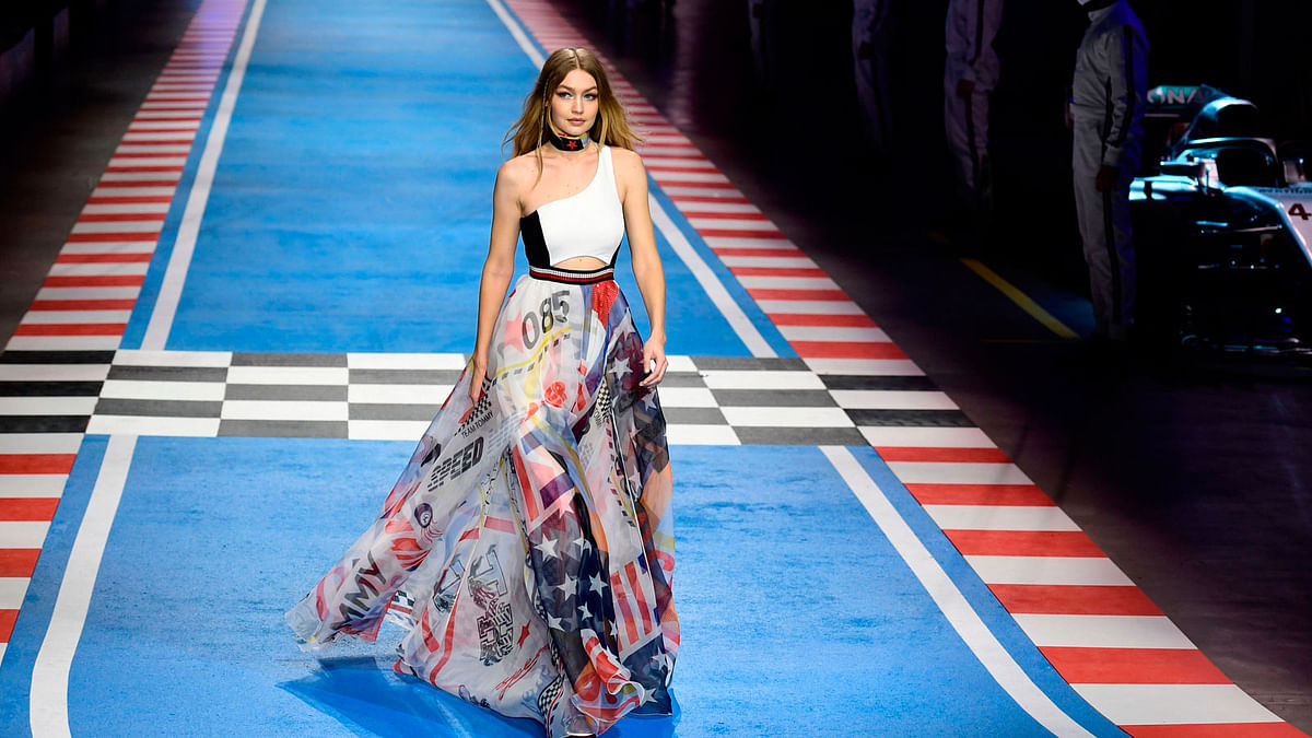US model Gigi Hadid presents a creation by Tommy Hilfiger during the women<SNG-QTS>s Fall/Winter 2018/2019 collection fashion show in Milan, Italy on 25 February. Photo: AFP