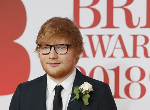 In this file photo taken on 21 February, 2018 British singer-songwriter Ed Sheeran poses on the red carpet on arrival for the BRIT Awards 2018 in London. Photo: AFP