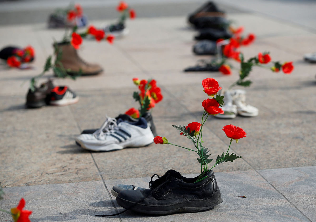 Shoes with flowers are pictured during a demonstration against the speech of Seyyed Ali Reza Avai, Minister of Justice of Iran, at the Human Rights Council, in front of the United Nations in Geneva, Switzerland on 27 February. Photo: Reuters