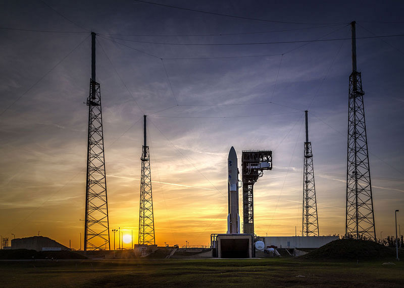 This NASA photo released on March 1, 2018 shows the Geostationary Operational Environmental Satellite (GOES-S) satellite as it sits on the launch pad at Space Launch Complex 41, Cape Canaveral Air Force Station, backdropped by the setting Sun on 28 February 2018.  Photo: AFP