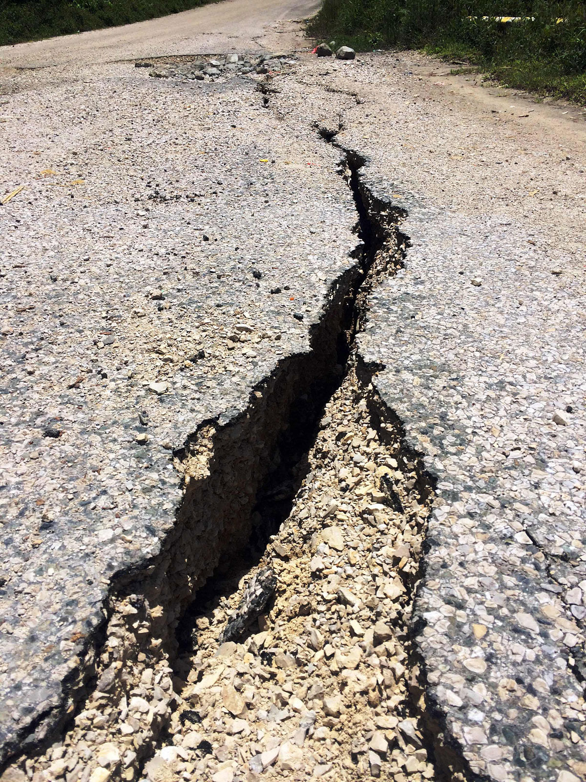 A damaged road after an earthquake near Mandi district, north-west of Papua New Guinea’s capital city of Port Moresby. AFP file photo