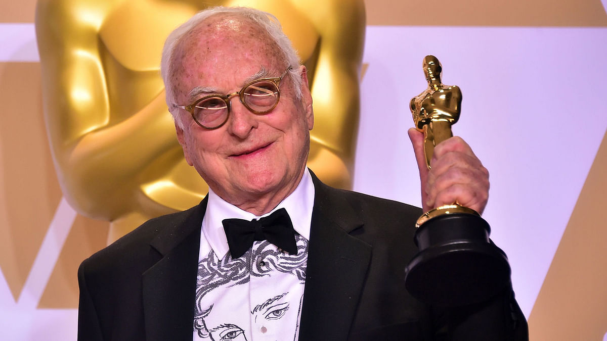 Writer James Ivory poses in the press room with the Oscar for Best Adapted Screenplay for `Call Me by Your Name,` during the 90th Annual Academy Awards on 4 Marc, 2018, in Hollywood, California. Photo: AFP