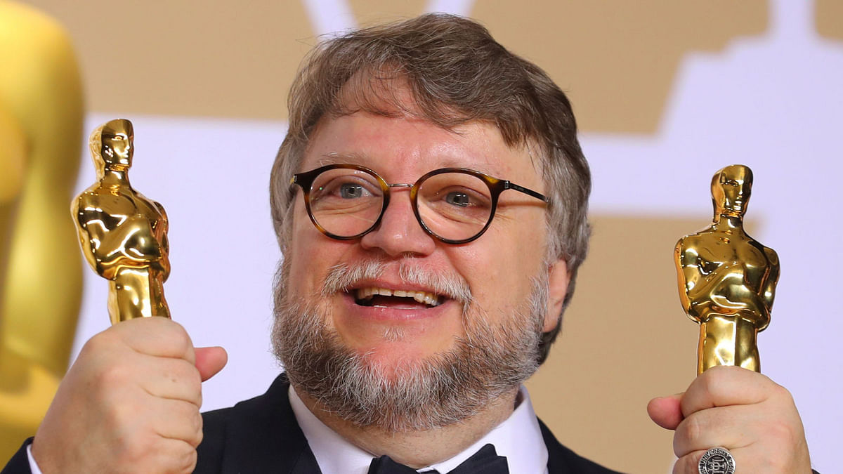 Guillermo del Toro with the Best Director Award and the Best Picture Award for `The Shape of Water` in 90th Academy Awards. Photo: Reuters