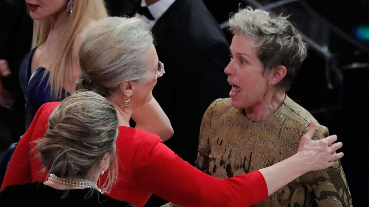 Meryl Streep congratulates Frances McDormand on winning the Best Actress Oscar for Three Billboards Outside Ebbing, Missouri. Photo: Reuters