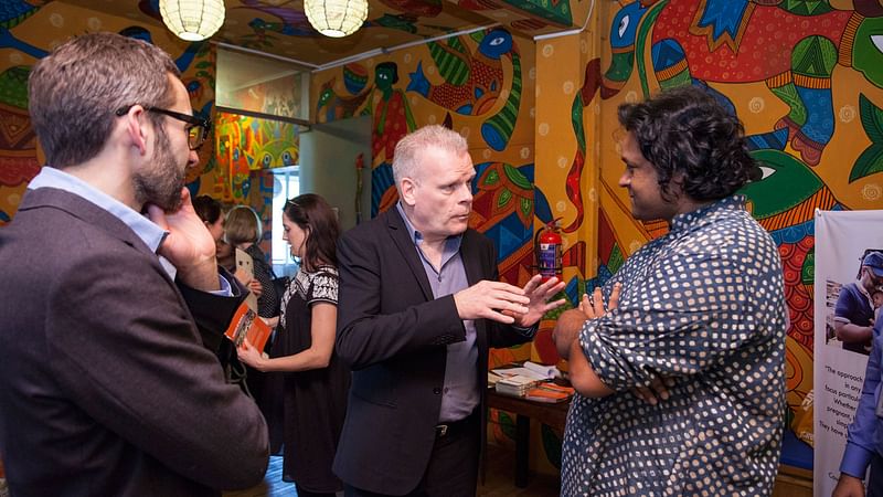 Danish ambassador Mikael Hemniti Winther at the exhibition. Photo: CARE