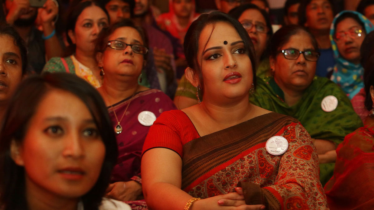 Actress Rumana Rashid Ishita, sitting in the audience, also voiced along with artistes singing. Photo: Ashraful Alam