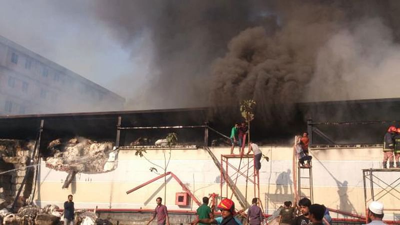 A fire broke out in Mosharaf Composit Ltd, a cotton storehouse in Baniarchala area in Gazipur. Photo: Prothom Alo