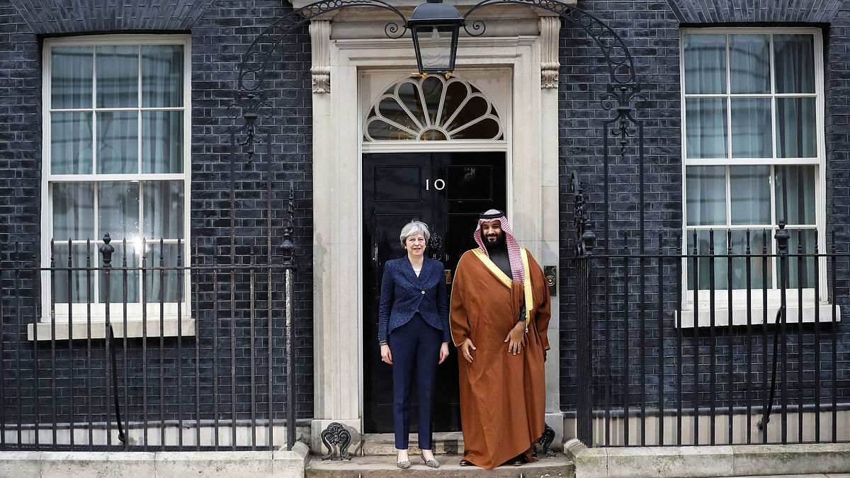 Britain`s Prime Minister Theresa May greets the Crown Prince of Saudi Arabia Mohammad bin Salman outside 10 Downing Street in London on 7 March. Reuters