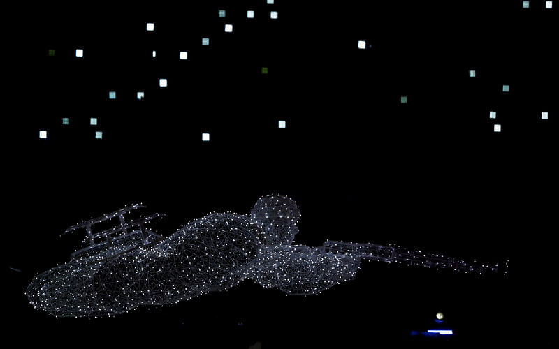 Pyeongchang 2018 Winter Paralympics - Opening ceremony - Pyeongchang Olympic Stadium - Pyeongchang, South Korea – 9 March 2018 - A biathlete is pictured with lights during the opening ceremony. Reuters