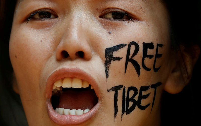 A Tibetan reacts after being detained by police during a protest held to mark the 59th anniversary of the Tibetan uprising against Chinese rule, outside the Chinese embassy in New Delhi, India on 9 March. Reuters