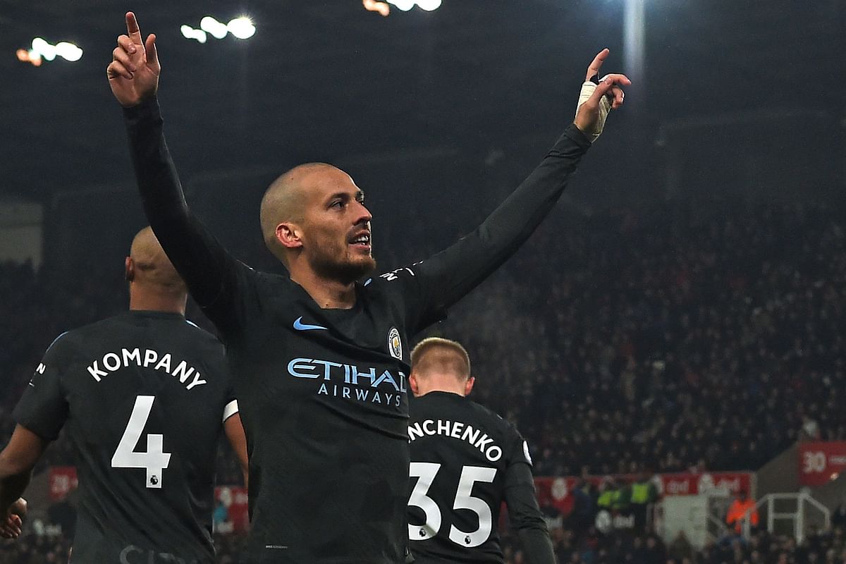 Manchester City’s Spanish midfielder David Silva celebrates after scoring his second goal of the English Premier League football match between Stoke City and Manchester City at the Bet365 Stadium in Stoke-on-Trent, central England on Monday. Photo: AFP