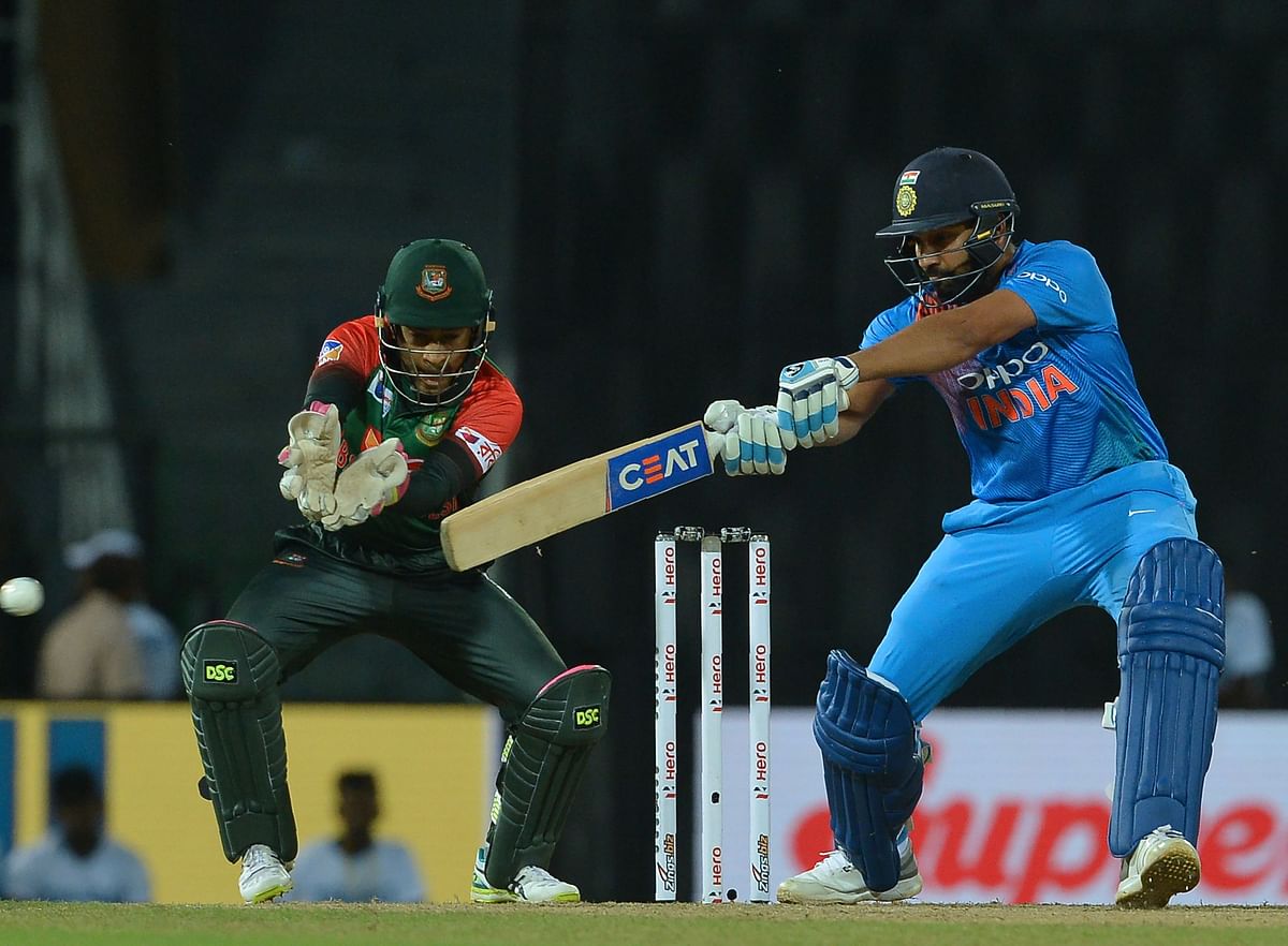 Rohit Sharma (in the picture) and Shikhar Dhawan have made 63 in 8 overs. AFP
