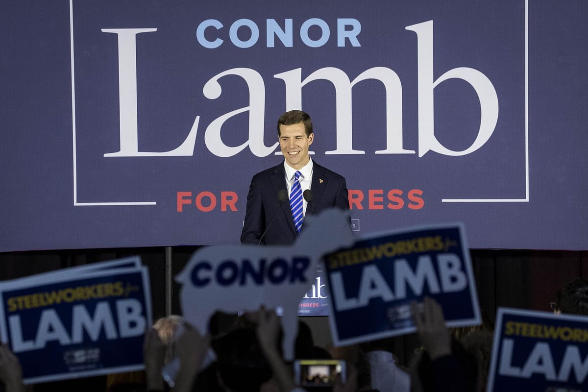 Conor Lamb, Democratic congressional candidate for Pennsylvania`s 18th district, speaks to supporters at an election night rally on 14 March 2018 in Canonsburg, Pennsylvania. AFP