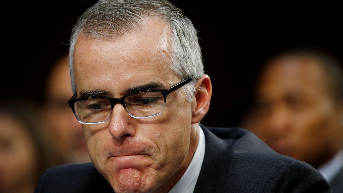 FBI Deputy Director Andrew McCabe pauses while testifying before a Senate Intelligence Committee hearing on the Foreign Intelligence Surveillance Act (FISA) in Washington, US on 7 June 2017. Reuters