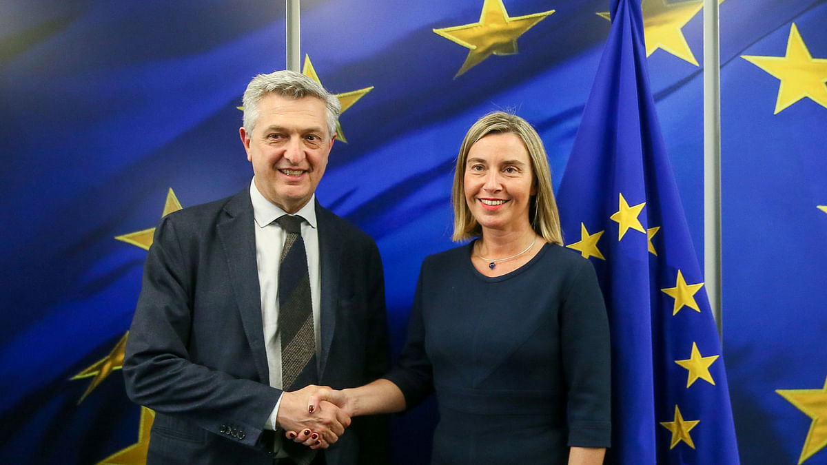 Filippo Grandi, United Nations High Commissioner for Refugees, is welcomed by European Union foreign policy chief Federica Mogherini prior to a meeting at the EU headquarters in Brussels, Belgium on 5 March 2018. Reuters
