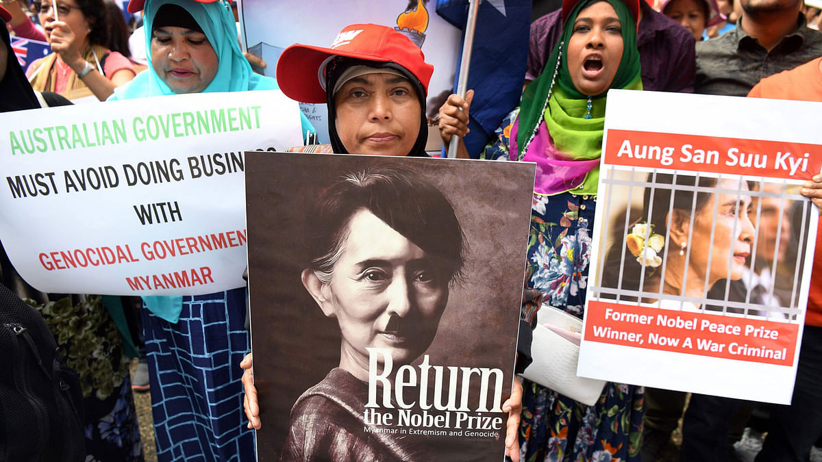 Protesters gather to demonstrate against Myanmar`s state counsellor Aung San Suu Kyi during the ASEAN (Association of Southeast Asian Nations)-Australia Special Summit in Sydney on 17 March 2018. AFP