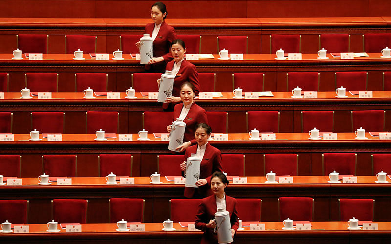 Tea is being served before the closing session of the National People`s Congress (NPC) at the Great Hall of the People in Beijing, China on 20 March. Photo: Reuters