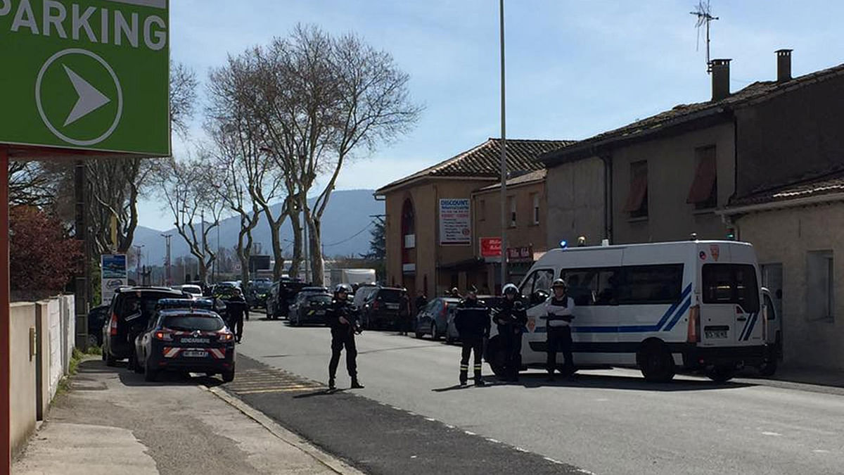 Police are seen at the scene of a hostage situation in a supermarket in Trebes, Aude, France 23 March, 2018 in this picture obtained from a social media video. Photo: Reuters