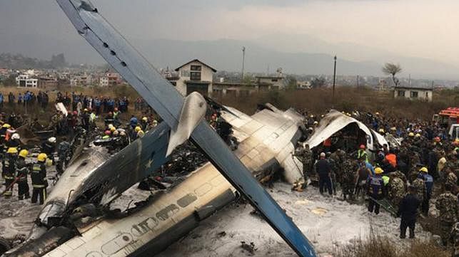 An aircraft of US-Bangla Airlines carrying 67 passengers and four crew crashes while landing at the airport in Kathmandu, Nepal on Monday. Photo: New York Times Twitter