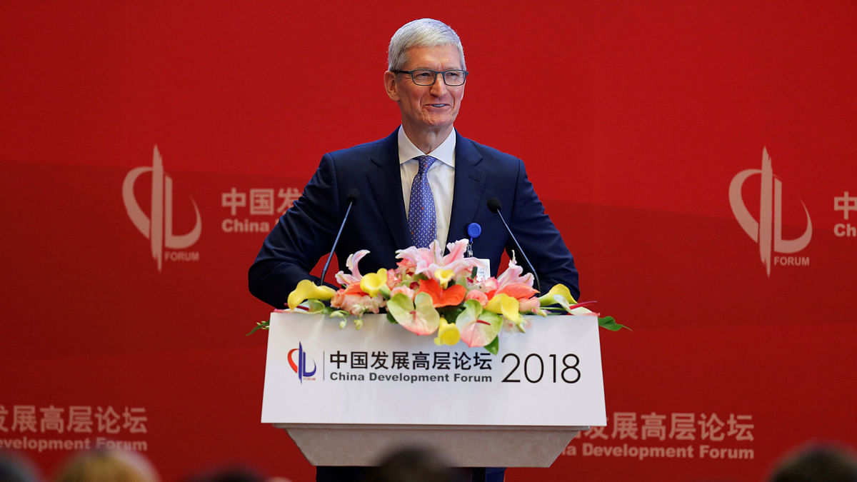 Apple Inc`s chief executive officer Tim Cook speaks at the China Development Forum in Beijing, China on 24 March 2018. Reuters