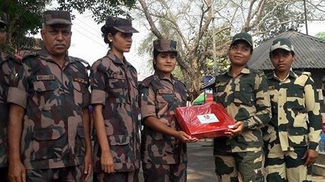 BGB and BSF exchange sweets to mark the Independence Day of Bangladesh along Dinajpur border. Photo: ASM Alamgir