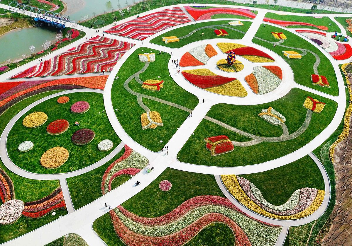 his photo taken on March 28, 2018 shows an aerial view of a park decorated with different coloured flowers in Nantong in China`s Jiangsu province. AFP