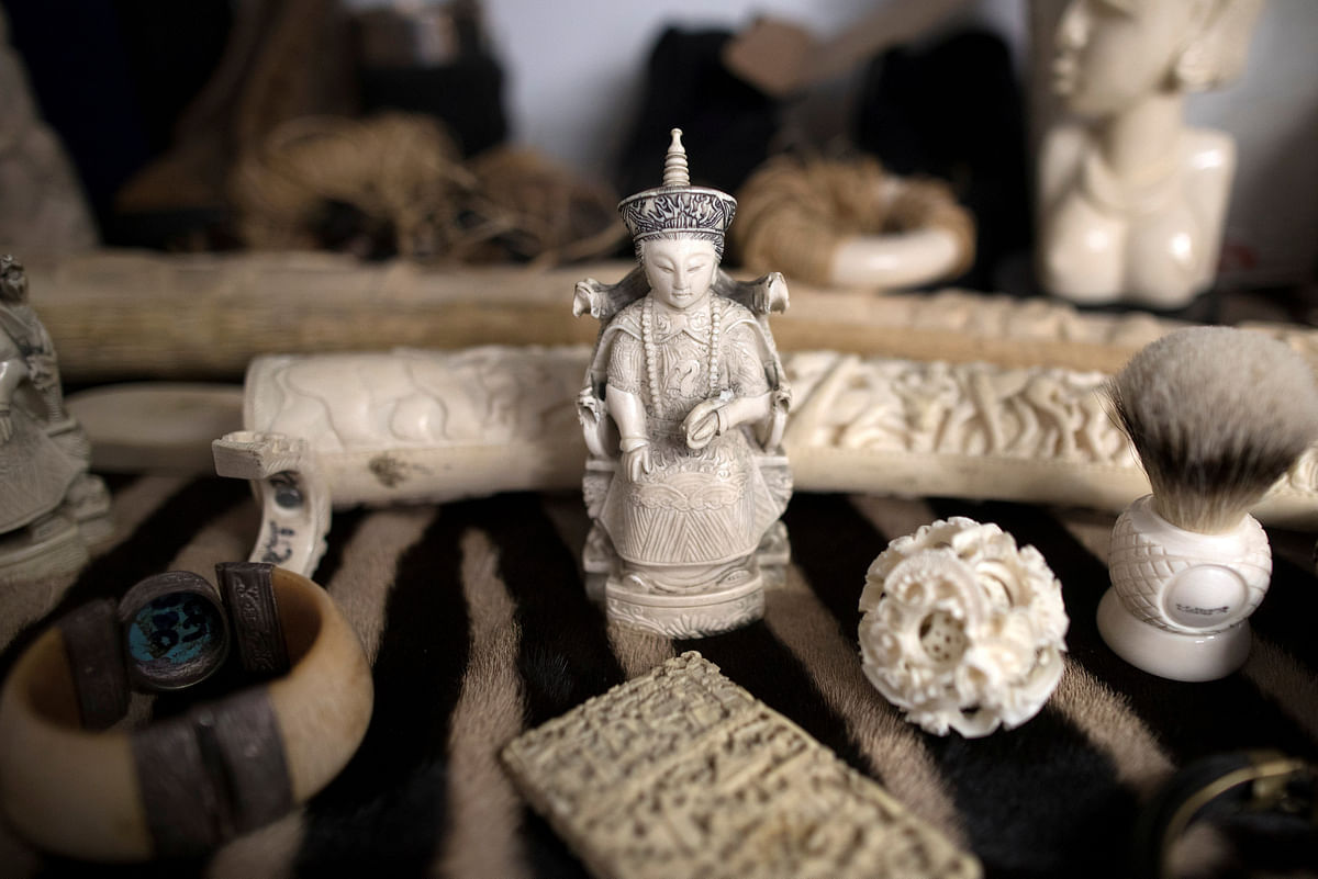 Ivory carvings seized by the UK Border Force at Heathrow Airport sit on display at Custom House near Heathrow in London, Britain, 22 November 2017. Reuters