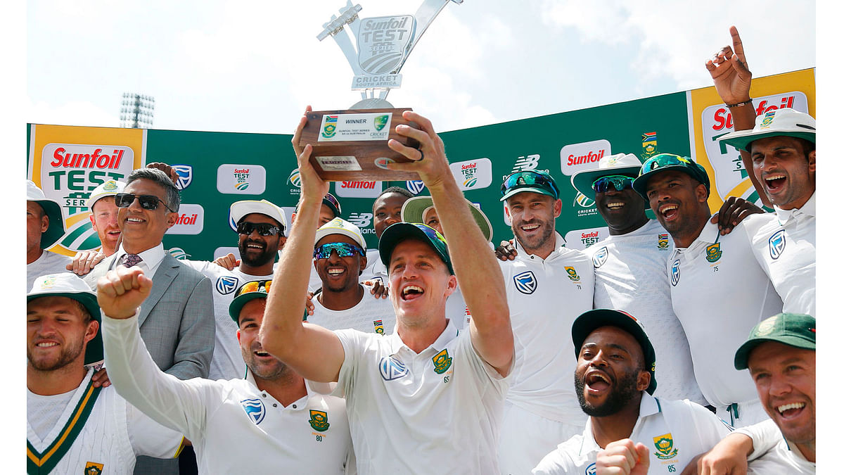 The South African team celebrate winning the Test series against Australia. AFP