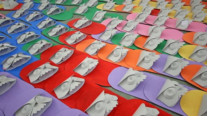 The newly coloured masks are laid for drying. Photo: Saiful Islam