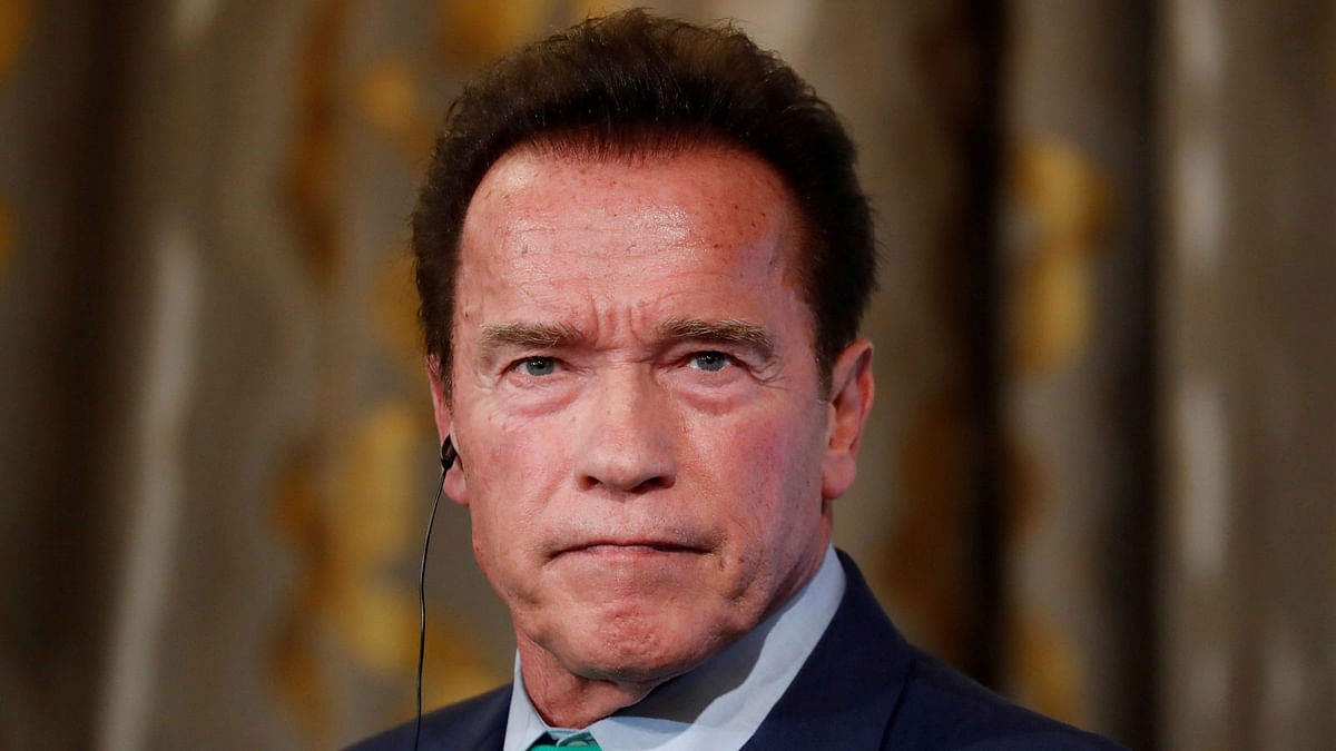 Actor and former California state governor Arnold Schwarzenegger attends a news conference ahead of the One Planet Summit in Paris on 11 December, 2017.