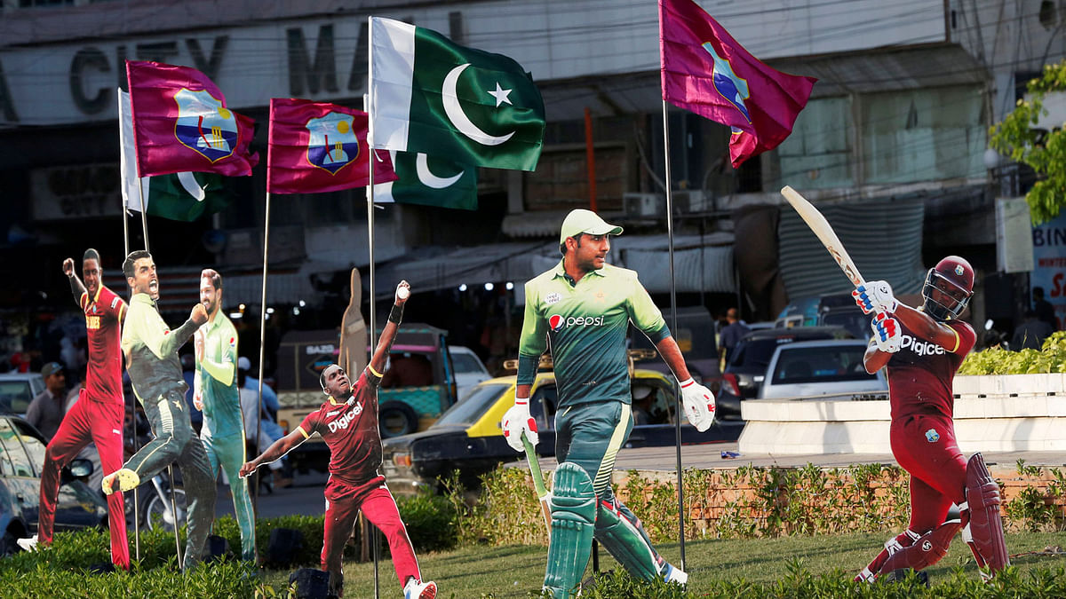 Life size posters of the cricket players are seen installed at a roundabout, during a test series between Pakistan and West Indies in Karachi, Pakistan on 1 April, 2018. Photo: Reuters