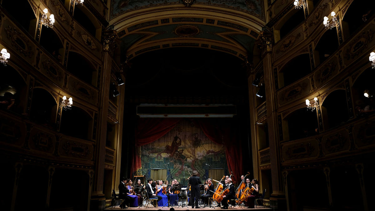 Musicians of the European Union Chamber Orchestra fine-tune their instruments at the start of their concert during the 12th International Spring Orchestra Festival at the Manoel Theatre in Valletta, Malta. Photo: Reuters