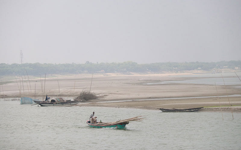 The photo taken on 7 April shows a long char (sand bar) that emerged from the Padma river in East Aliabad, Faridpur. Photo: Alimuzzaman