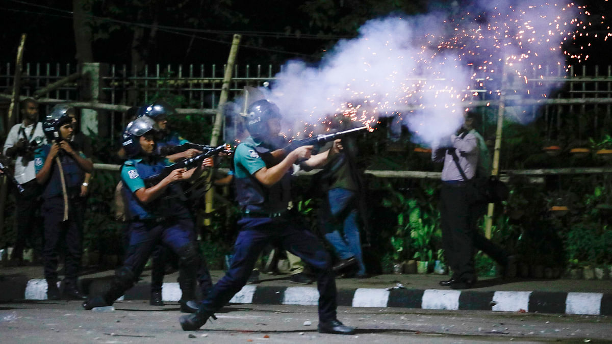 Police fire tear gas at the protestors on 8 April. Photo: Suvra Kanti Das
